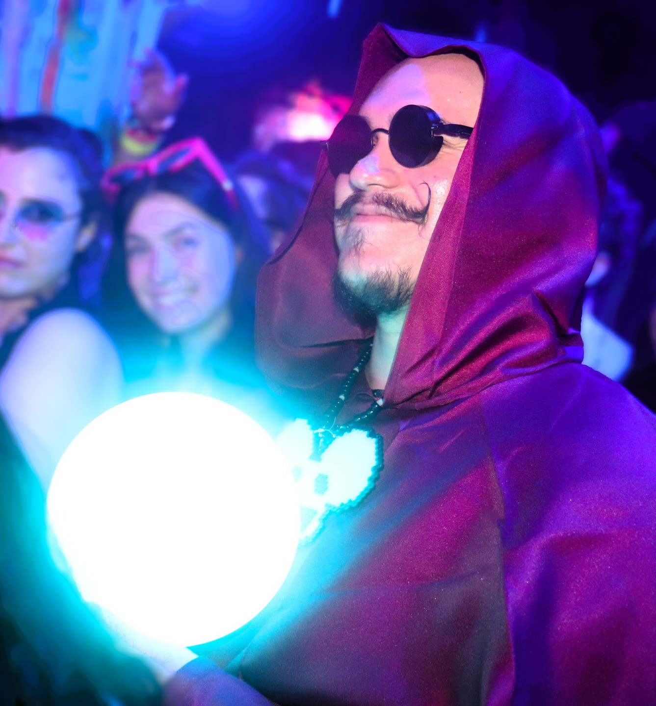 Nightlife portrait under blue and magenta lighting