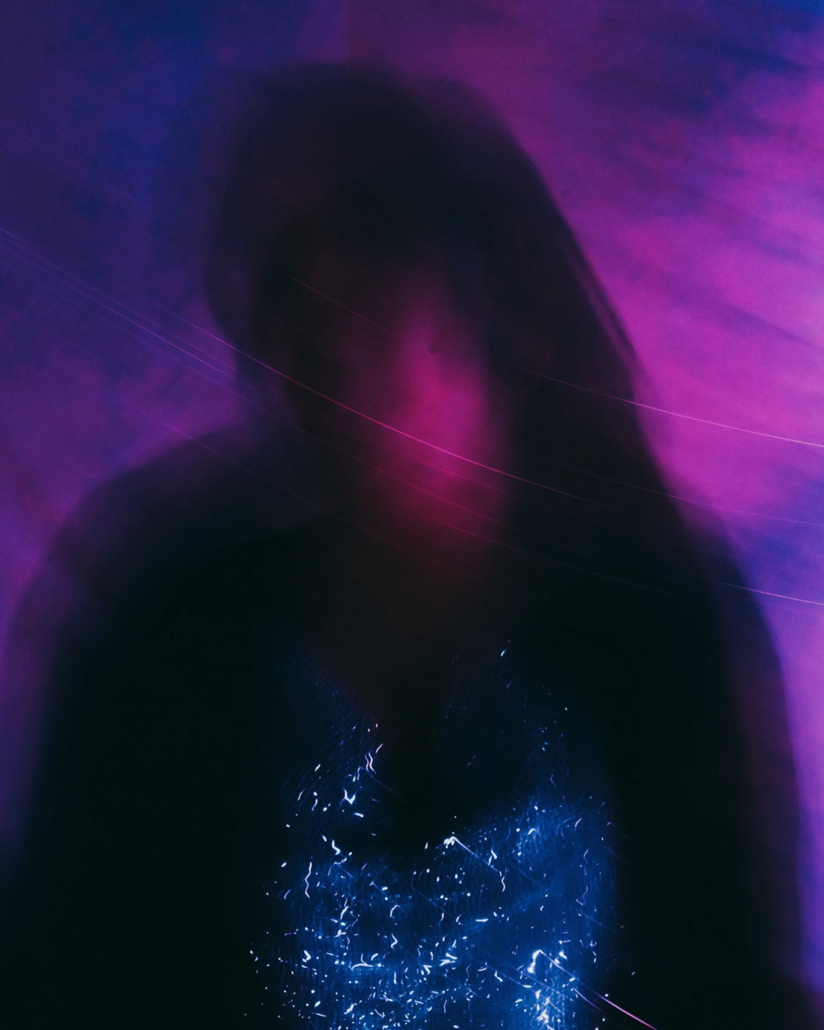 Experimental portrait with motion and colored light