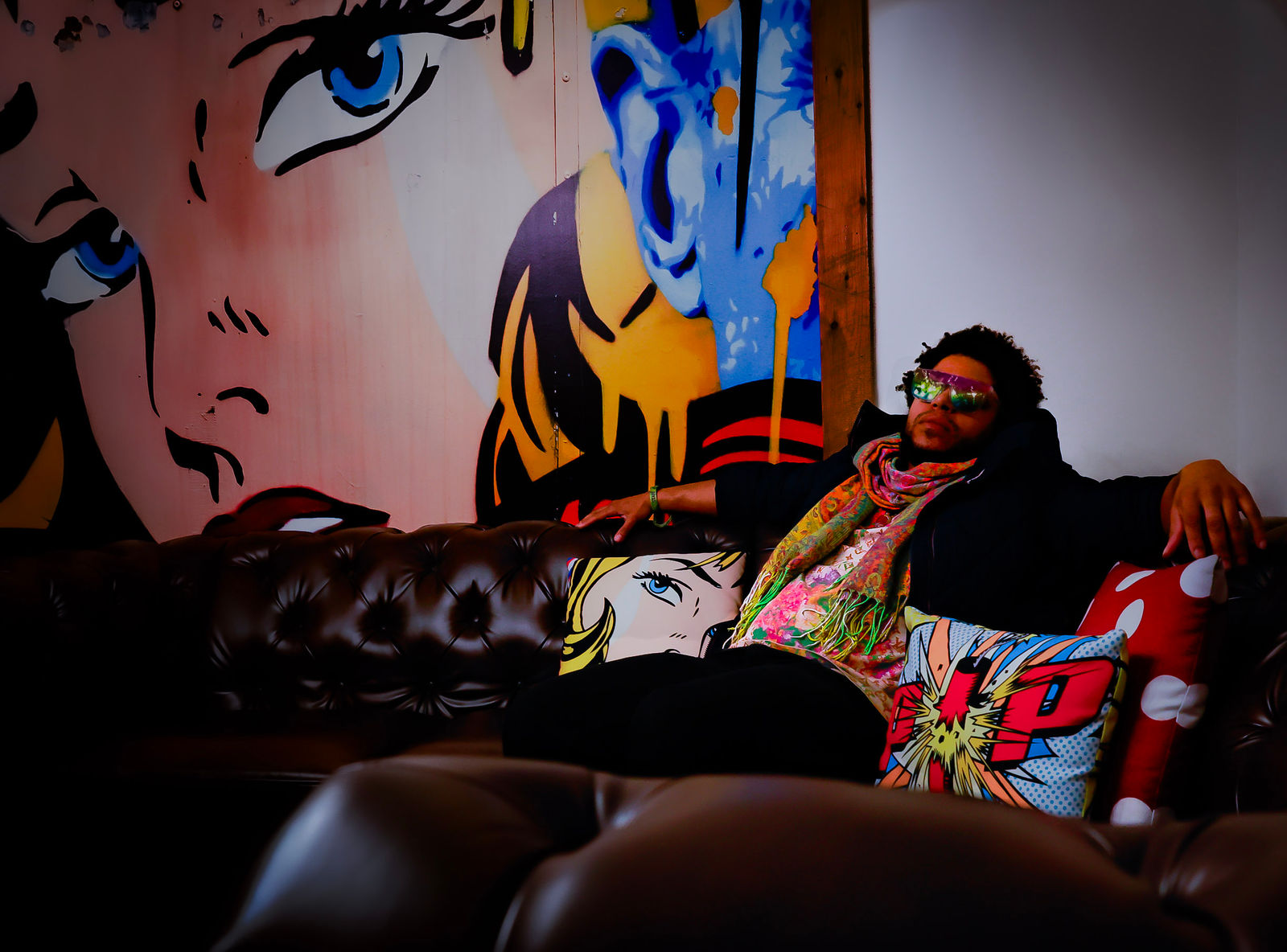 Editorial portrait in front of pop art
